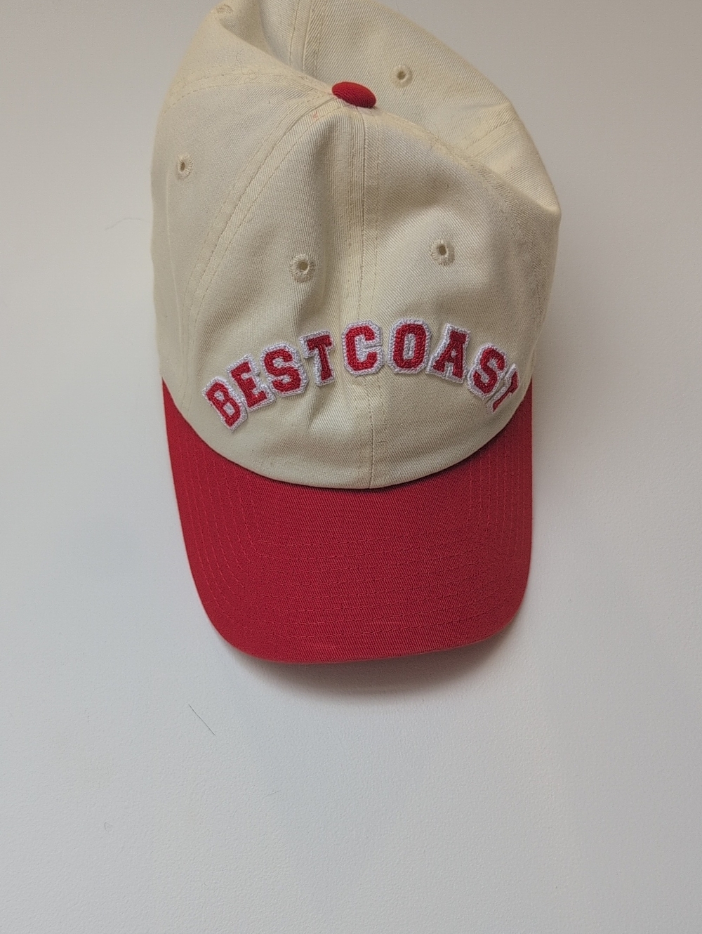 American Needle Cap in Cream and Red with 'BESTCOAST' Embroidery